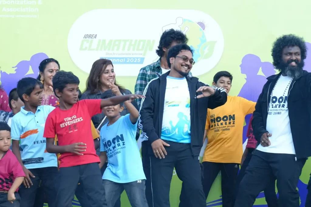 Group of children performing on stage.